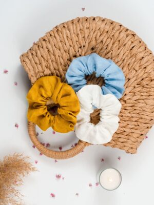 Linen yellow, blue and white scrunchie on a bag