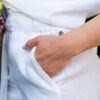Hand in white pocket