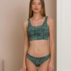 Woman dressed in organic cotton green brazilian bikini and green top