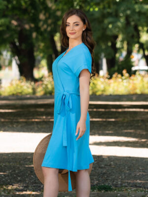 Woman wearing a blue wrap dress