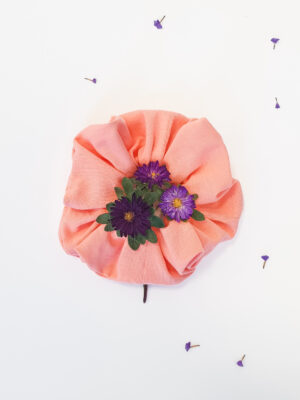 Organic cotton peach color scrunchie with flowers inside