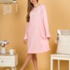 Woman wearing pink organic cotton pajama-dress