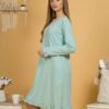 Woman wearing turquoise organic cotton pajama-dress