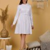 Woman with brown hair wearing organic cotton white hooded dress