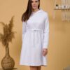 Woman with brown hair wearing organic cotton white hooded dress