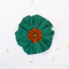 Organic cotton green scrunchie with flower inside
