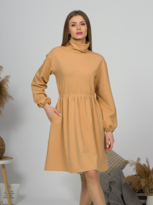 Woman with blond hair wearing organic cotton doe color polo dress