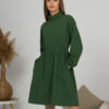 Woman with blond hair wearing organic cotton dark green color semi-polo dress