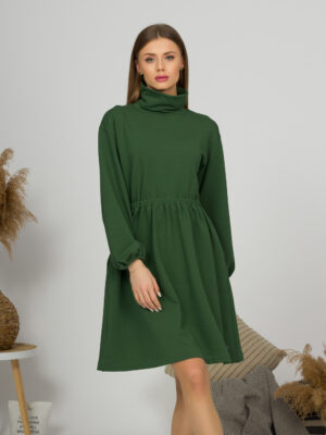 Woman with blond hair wearing organic cotton dark green color semi-polo dress