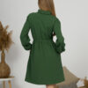 Woman with blond hair wearing organic cotton dark green color semi-polo dress