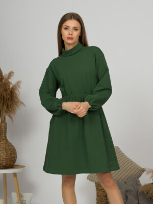 Woman with blond hair wearing organic cotton dark green color semi-polo dress