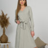 Woman with blond hair wearing organic cotton gray color long sleeves dress with coconut buttons