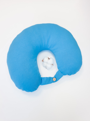 Travel pillow made of organic cotton with hypoallergenic down filling in blue color