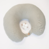 Travel pillow made of organic cotton with hypoallergenic down filling in gray color