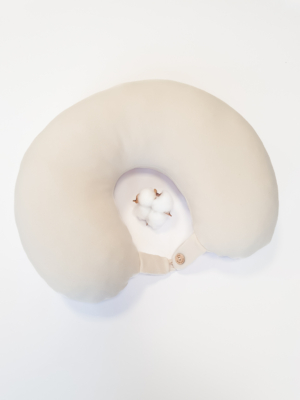 Travel pillow made of organic cotton with hypoallergenic down filling in off white color