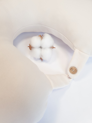 Travel pillow made of organic cotton with hypoallergenic down filling in off white color