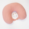 Travel pillow made of organic cotton with hypoallergenic down filling in pink color
