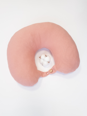 Travel pillow made of organic cotton with hypoallergenic down filling in pink color