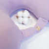 Travel pillow made of organic cotton with hypoallergenic down filling in purple color
