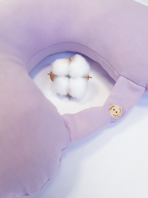 Travel pillow made of organic cotton with hypoallergenic down filling in purple color