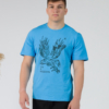 Young man wearing organic cotton blue color t-shirt with colored print and black trousers