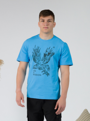 Young man wearing organic cotton blue color t-shirt with colored print and black trousers