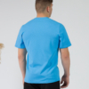 Young man wearing organic cotton blue color t-shirt with colored print and black trousers