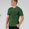 Young man wearing organic cotton green color t-shirt with colored print and black trousers