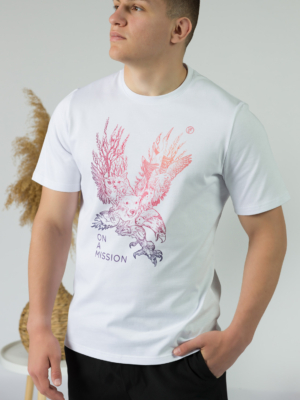 Young man wearing organic cotton white color t-shirt with colored print and black trousers