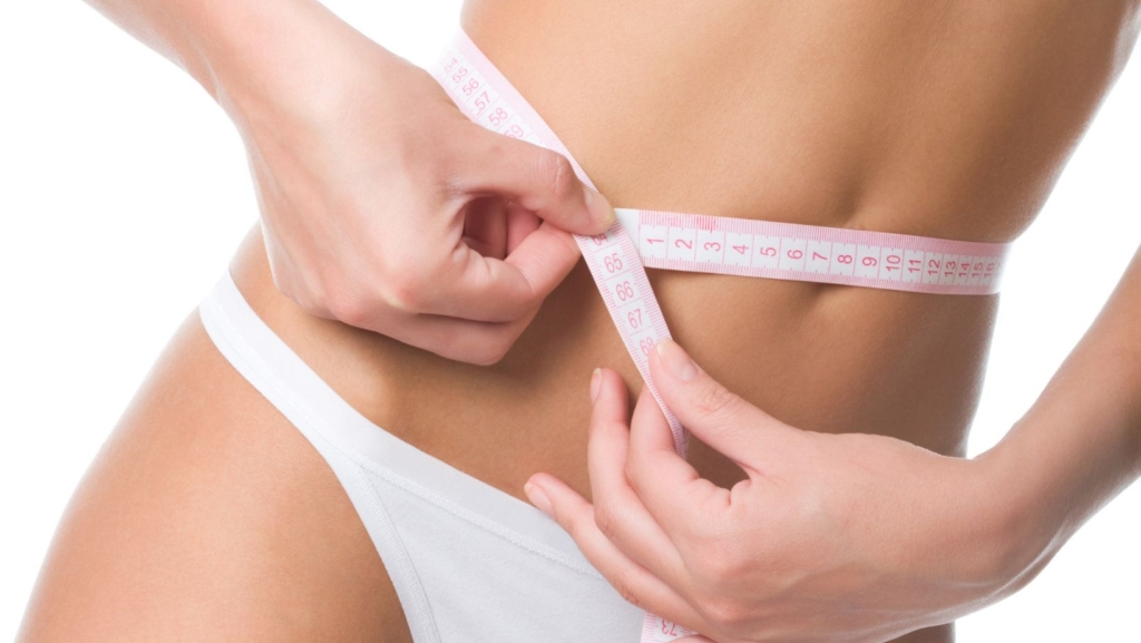 Woman measure her body