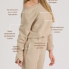 woman with blond hair wearing beige organic cotton elegant blouse and beige organic cotton long tapered leg pants