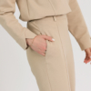 beige organic cotton elegant blouse and beige organic cotton long tapered leg pants