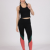 Women with brown hair is wearing black organic cotton tank top and multicolored organic cotton leggings
