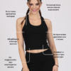 Women with brown hair is wearing black organic cotton tank top and black organic cotton leggings