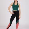Women with brown hair is wearing green organic cotton tank top and multicolored organic cotton leggings