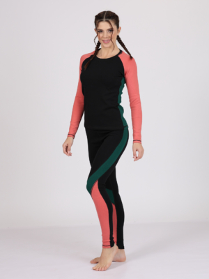 Women with brown hair is wearing multicolored organic cotton long sleeve top and multicolored organic cotton leggings