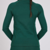 Women with brown hair is wearing dark green organic cotton long sleeve top and dark green organic cotton leggings