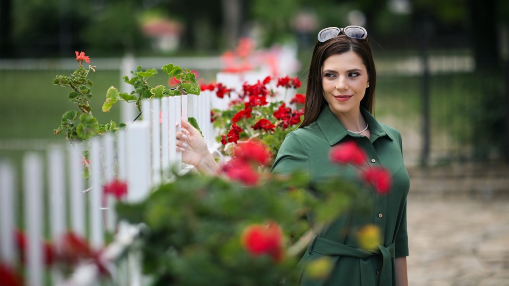 Woman in a green organic cotton dress