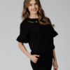 Woman wearing black organic cotton pants and black organic cotton t-shirt with embroidery "Let it bee"